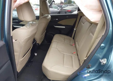 2015 Honda Cr-V Touring z USA, uszkodzony, nr VIN 5J6RM3H94FL023993